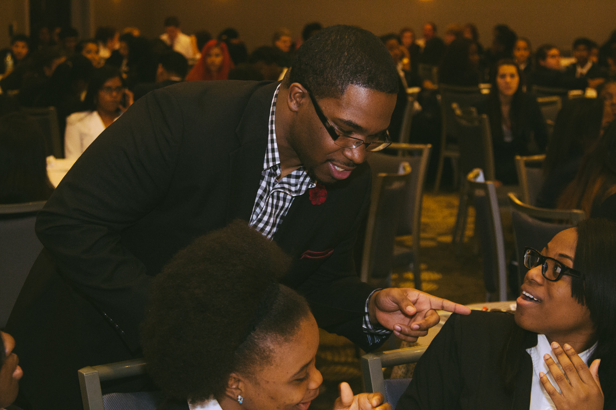 Geo connecting with students at the NY HOSA State Conference